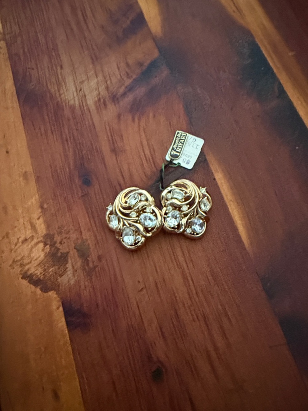 vintage Crown Trifari gold-toned crystal clip-on earrings.